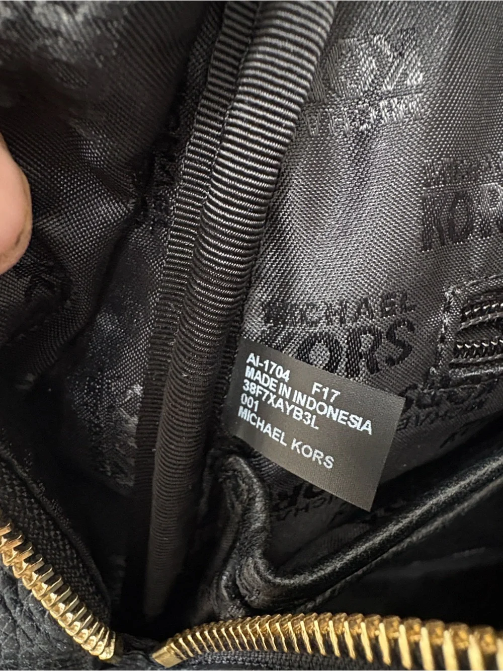 Michael Kors Black Pebbled Leather Small Backpack with Gold Plaque